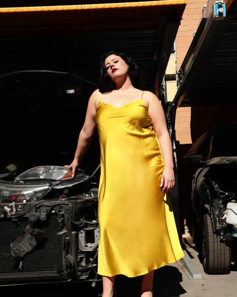 Front of a model wearing a size 1X The Best Curve Bias Cut Bamboo Slip Dress in Acid Yellow by Sante Grace. | dia_product_style_image_id:237601